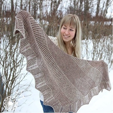 Alternating vertical and horizontal stripes give this shawl it interesting look