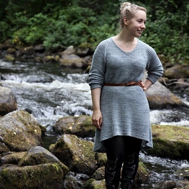 Broken ribbing gives this dress an interesting look