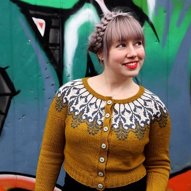 Budding has delicate flower pattern around the yoke