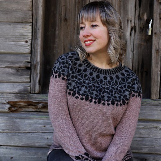 A simple pullover with beautiful flower colorwork on the yoke.