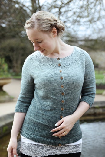 The cardigan has lovely little buttons in the front